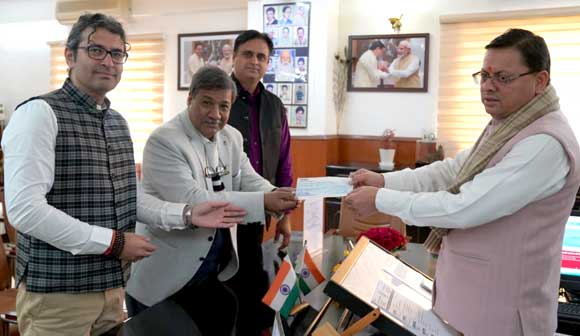 Chancellor of the University of Petroleum and Energy Studies, Dr. Sunil Rai handed over a check of five lakh rupees to the Chief Minister Dhami for the help of the victims of landslide in Joshimath.