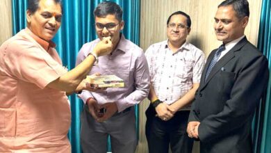 Minister Dr. Premchand Aggarwal congratulated Anshul Bhatt on securing 22nd rank in the IAS exam